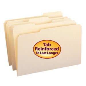 Four manila Smead file folders with reinforced 1/3-cut tabs slightly overlap, each featuring a large oval sticker reading Tab Reinforced To Last Longer in purple on orange. These durable legal-size folders are available 100 per box (15334).
