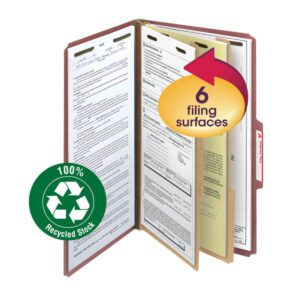 The Smead 100% Recycled Pressboard Classification File Folder (19046) in red, is shown open with papers inside and has a circular label indicating 6 filing surfaces. It features a green recycling symbol that reads 100% Recycled Stock. Sold in packs of 5.