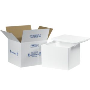 The scene features the MH-USA 12 x 10 x 9 Insulated Shipping Kit, a styrofoam cooler with a lid, next to an open cardboard box marked with blue text and arrows saying Perishable This Side Up and Rush Perishable Insulated for secure transportation.