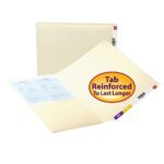 On the desk are two beige file folders, one of which is a Smead End Tab Pocket Folder with a large round label stating Tab Reinforced To Last Longer. The open folder reveals tabbed dividers and documents inside.