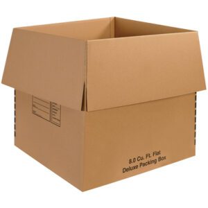 The large open cardboard box with outward-folded flaps bears black text reading 8.0 Cu. Ft. Flat Deluxe Packing Box, similar to the MH-USA 24 x 24 x 24 Deluxe Packing Boxes sold in ten-per-bundle, featuring a content-labeling grid on the side.