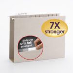 The Smead TUFF? Hanging Box Bottom Folder in steel gray, featuring a 1/3-Cut Easy Slide? Tab, is displayed. An inset shows a hand sliding the tab. A large oval label on the folder boasts its 7X stronger, offering durability for your organizational needs.