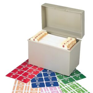 The gray card file box with A-Z index cards is encircled by Smead AlphaZ ACCS Color-Coded Alphabetic Labels (67170) in assorted colors, including red, blue, green, and orange.