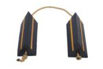 The Vestil Rubber Airline Wheel Chock W/Rope 6 X 18 features two durable black triangular wheel chocks with yellow stripes, linked by a beige rope, ensuring vehicles remain safely stationary when parked.