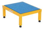 The Vestil Adj Steel Stand is a durable, yellow metal step stool with a blue non-slip top and black rubber feet, providing stability and safety. Its square-shaped and has adjustable heights of 10.5 to 16.5 inches on a 19 x 24-inch platform.