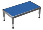 The Vestil Adj Ss Stand has a blue rectangular platform with a textured surface and four height-adjustable metal legs, featuring black rubber feet for stability.