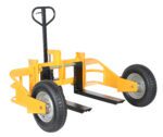 The Vestil All Terrain Pallet Truck Hd 2.5K 32 In has a yellow frame, black handle, and robust metal forks for efficient heavy item transport. Its large black wheels make it ideal for navigating diverse surfaces with ease.