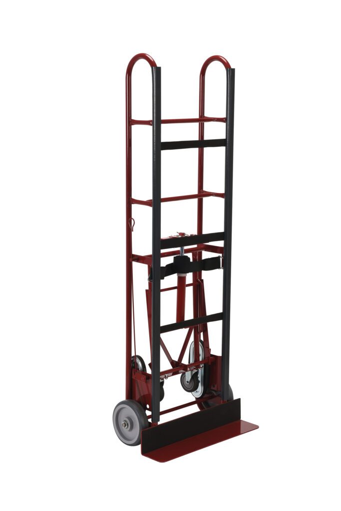 The Vestil Vending -Appliance Cart Ratchet 66 In is a robust two-wheeled red and black cart with a metal frame and flat loading platform. Designed for heavy items, it features curved handles for easy grip and maneuvering, with wheels at the base for stability.