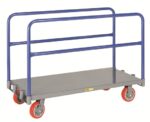 The Little Giant Adjustable Sheet & Panel Truck is a gray flatbed trolley with blue side rails and four red casters, perfect for moving large panels or boards. Its robust metal build makes it ideal for industrial and commercial use.