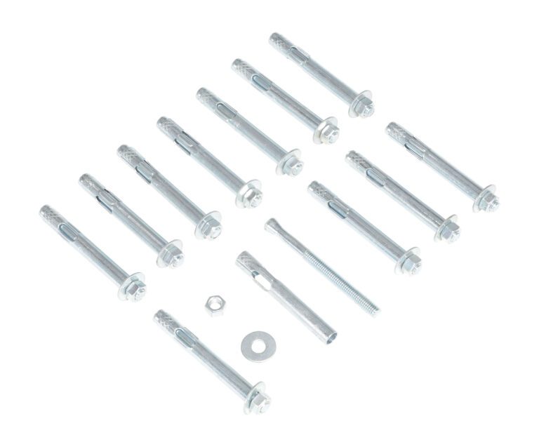 Thirteen metal anchors, one nut, and one washer are arranged on a white surface. The identical and evenly spaced anchors feature a bolt and sleeve design similar to the Vestil 12-Pack Concrete Anchor Bolts 1/2 X 4 In.