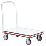 The sturdy Vestil Alum Treadplate Platform Trk 24X36 features a handle, flat checkered surface, and four wheels for smooth movement. Its edges are adorned with bold diagonal red and white stripes.