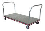 The Vestil Alum Treadplate Platform Trk 36X69 Dual Hdl is a flatbed trolley with a durable metal platform, four smooth-rolling wheels, U-shaped handles on both ends, and edges featuring a striking red and white striped pattern for enhanced visibility.