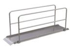 The Vestil Alum Walk Ramp Handrail Overlap, 120 x 28 inches, features a metallic finish and robust side rails. Its textured surface and sloped end improve accessibility, while the minimalist design contrasts against a white backdrop.