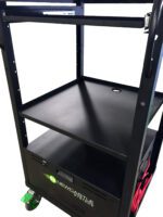 A black multi-tiered rolling cart with shelves, featuring a logo reading Newcastle Systems at the bottom. It has green wheels and red cables neatly coiled on one side.