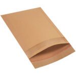 A brown envelope with a red strip along the opening, like the sturdy 12 1/2 x 15 Lbs6 Jiffy Rigi Bag® Mailers (100/Case), rests on a white background. It is slightly open, revealing the inner flap.