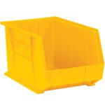 The MH-USA 10 3/4 x 8 1/4 x 7 yellow plastic stack & hang bin boxes, with six bins per case, feature an open front and reinforced sides ideal for organizing items. The white background highlights their sturdy construction and functional design.