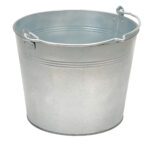 A Vestil Galvanized Steel Bucket, 3.25 Gallons, featuring a metallic finish with a smooth surface and sturdy handle, sits upright against a white background. Its cylindrical shape is accented by two horizontal embossed lines near the top.