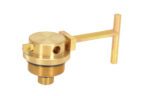 A brass valve with a threaded base and round flat top features a Vestil Drum Lock lever arm, extending horizontally into a T-shaped handle. It includes a hex nut for installation and has a 5/16-inch padlock hole for security. Product: Vestil Drum Lock Brass 5/16 In Padlock Hole.