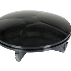 A black, round object with a glossy domed surface resembles the Vestil Bollard Cap Plastic Replacement 5.5 In. Elevated by three dark gray legs, it looks like a small UFO or dome sitting at an angle.