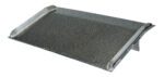 The Vestil Aluminum Truck Dockboard 10000 Lbs 72x36 is a durable aluminum ramp with a diamond-patterned surface and raised edges for enhanced safety and grip, supporting up to 10,000 lbs. Its angle is perfect for loading=