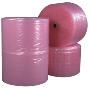 Three MH-USA 3/16 x 12 x 750 perforated anti-static air bubble rolls are stacked; two upright, one on its side. The textured surface is shiny and reflective, ideal for protective packaging.