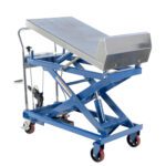 The Vestil Sequence Lift & Tilt Cart 1K 22 X 33.5 features a blue hydraulic scissor lift with a metal platform and four red wheels. It includes a maneuvering handle and a foot pump for height adjustment, ideal for heavy-duty lifting tasks.