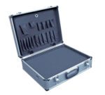 The Vestil Aluminum Carrying Case-Foam Insert 40Lb has a black interior with assorted-sized lid compartments, a spacious padded base, metallic edges, and a robust black handle for enhanced protection and organization.