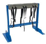 The blue metal frame features a padded green top and multiple hanging black straps with clips, offering strong support for physical therapy or rehab. It ensures stability as reliably as the Vestil Cylinder Bracket Stand 6 Cylinder Cap.