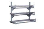 The gray Little Giant Welded Cantilever Rack features three horizontal beams and vertical supports, ideal for storing long items like pipes or beams. Its robust metal build is expertly crafted for efficient storage.