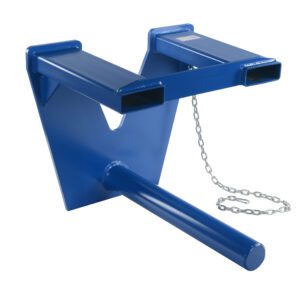The Vestil Coil Lifter Fork Mounted 3000 Lb 24 In, a blue metal hitch attachment, has a V-shaped base with two rectangular slots and a long cylindrical arm. A silver chain connects to one side for efficient towing or lifting up to 3000 lbs.