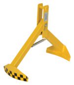A yellow wheel clamp with a checkered black and yellow pattern mirrors the robust design of the Vestil Crane/Hoist Drum Lifter 20-25 In Dia, featuring a sturdy metal frame and spring mechanism to secure a vehicles wheel for security or parking enforcement.