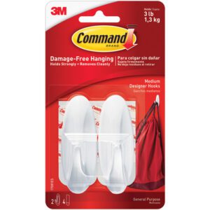 Command™ Designer Hooks and Strips 17081 (6 Sets) feature medium hooks for damage-free hanging, including two white hooks and four adhesive strips. They support up to 3 lbs (1.3 kg), with a red-accented background emphasizing general-purpose use.