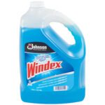 A large jug of Windex® - 1 Gallon Refill (4/Case) glass cleaner with ammonia has blue liquid, a built-in handle, and promises streak-free shine. The label includes details in English, French, and Spanish.
