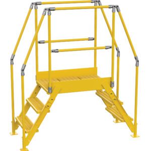 The Vestil Cross-Over Ladder 3 Step offers a yellow industrial metal platform with stairs on both sides and railings. It features non-slip tread surfaces, stands 28 inches high, and is 26 inches wide, providing freestanding access or enhanced safety in work settings.