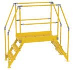 The Vestil Cross-Over Ladder 3 Step is yellow, featuring railings on both sides for secure navigation over obstacles. Standing 28 inches high and 38 inches wide, it is crafted from metal for industrial use, ensuring stability and safety.