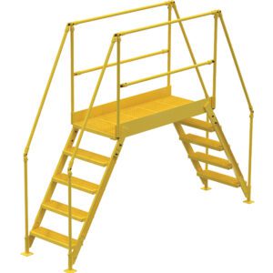The Vestil Cross-Over Ladder 5 Step 48 H 50 W In features a sturdy yellow metal design with two sets of steps leading to a grated platform and handrails for safety, ensuring secure passage over obstacles.