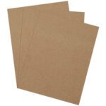 On a white backdrop, three brown kraft paper sheets are slightly off-center, resembling MH-USA 9 x 12 Heavy Duty Chipboard Pads (640 Pads/Case), known for their durability and reliability.
