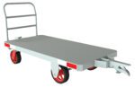 A gray Vestil Caster Steer Towable Trailer, capable of carrying up to 4K lb, includes a handle and four red wheels. It has a metal frame for transporting goods and features a tow bar for vehicle attachment, all shown on a white background.