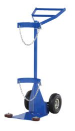 The Vestil Deluxe Cylinder Dolly-Pneumatic Wheels has a blue vertical steel design with two pneumatic wheels, stabilizing feet, two chain loops for securing contents, and a handle for easy movement, ensuring safe and efficient transportation.