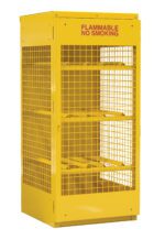 The yellow Vestil Vertical Cylinder Cabinet-5-10 Kd storage cage, featuring three shelves and a grid design, ensures safety with its sturdy build. Its top front panel warns FLAMMABLE NO SMOKING in red, promoting safety and ventilation even when empty.