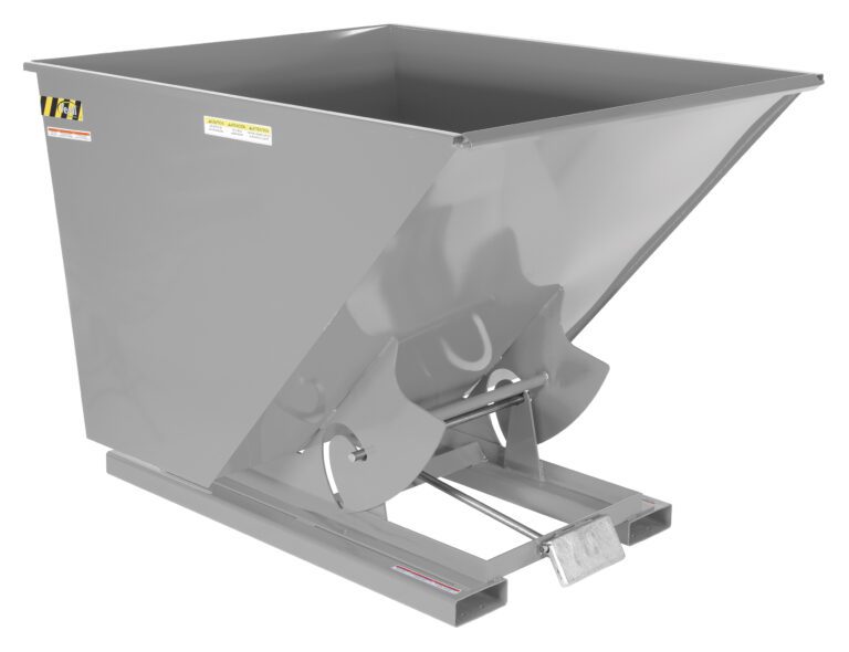 The Vestil Self-Dump Hopper, model 2 Cu Yd 4K, in machine gray, features a smooth surface with angled sides and warning labels. It sits on a tilting frame suitable for easy dumping, resembling an industrial unit with a 2-cubic-yard capacity.