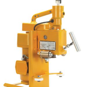 The Vestil High Duty Elec Drum Deheader 1-2 Pass is a yellow industrial machine with a sturdy handle and metal components. It features a control lever, top-mounted power plug, and side label with technical details, all set against a pristine white background for an efficient design.