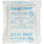 The 5 x 5 1/2 x 1/2 Tyvek® Clay Desiccants come in a 34 Gal Drum, with each white silica gel packet labeled DESI PAK, featuring blue text detailing manufacturer info and usage instructions, plus a cautionary DO NOT EAT message.