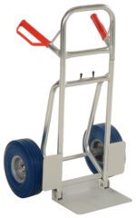 The Vestil Fold-Down Aluminum Hand Truck-Blue Ureth has red handles, two large blue urethane wheels, a lightweight aluminum frame, and a sturdy base plate, ideal for efficient item transport.