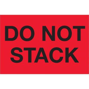 A vibrant red sign with bold black letters reads DO NOT STACK, similar to MH-USA 2 x 3 fluorescent red labels (500/roll).