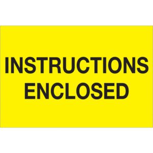 The sign, with bold black text on a bright yellow background, reads INSTRUCTIONS ENCLOSED, similar to MH-USAs 2 x 3 Fluorescent Yellow Labels (500/Roll).