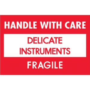 A red and white sign reads, HANDLE WITH CARE, DELICATE INSTRUMENTS, and FRAGILE in bold capitals, similar to the MH-USA 2 x 3 - Delicate Instruments - HWC Fragile Labels (500/Roll) for protecting sensitive items.