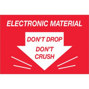 A red sign with white text reads ELECTRONIC MATERIAL on top and DONT DROP, DONT CRUSH inside a downward-pointing arrow. Ideal for labeling, these MH-USA 2 x 3 labels offer 500 per roll for electronic material needs.