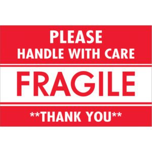 A sign with bold letters reads PLEASE HANDLE WITH CARE FRAGILE THANK YOU, similar to MH-USAs 2 x 3 Fragile - Handle With Care labels, available in a roll of 500.