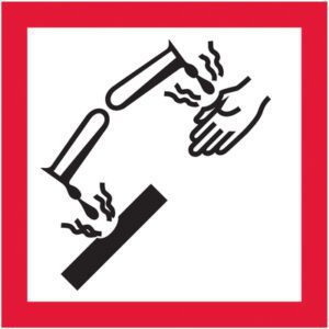 MH-USA 2 x 2 Pictogram - Corrosion Labels (500/Roll) showcase a vivid hazard symbol of a test tube spilling corrosive liquid on a surface and hand, featuring damage lines within a red-bordered square for enhanced visibility.